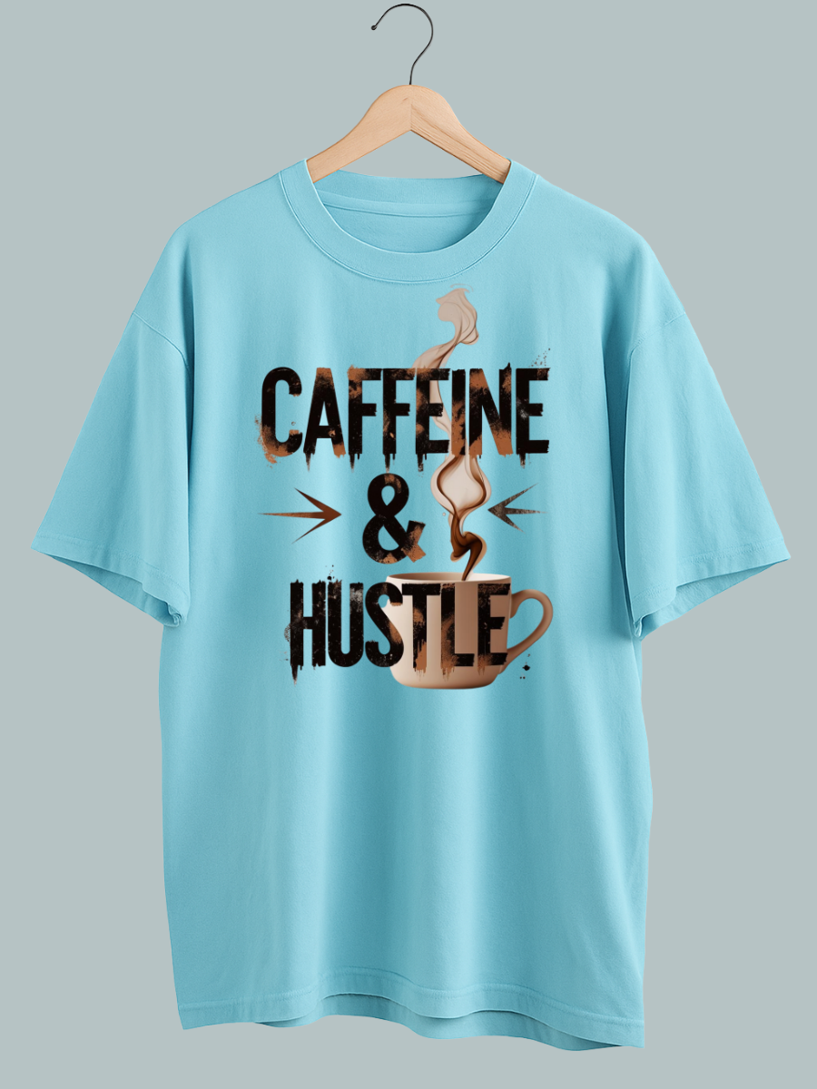 "Bold graphic tee with ‘Caffeine & Hustle’ quote — symbolizing energy, grind, and ambition."