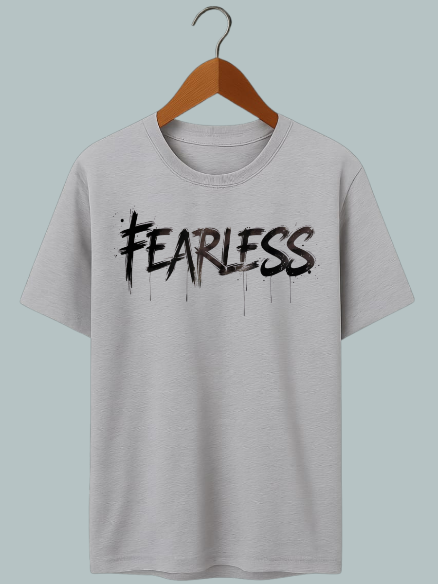 "Graphic oversized tee featuring empowering ‘Fearless’ quote — symbolizing confidence and courage."