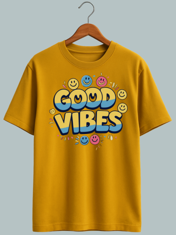 "Feel-good oversized tee featuring cheerful ‘Good Vibes’ quote in colorful or bold typography."